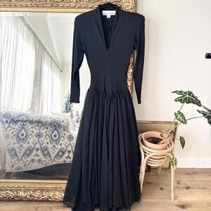 1980s Norma Kamali iconic fit and flare dress in black